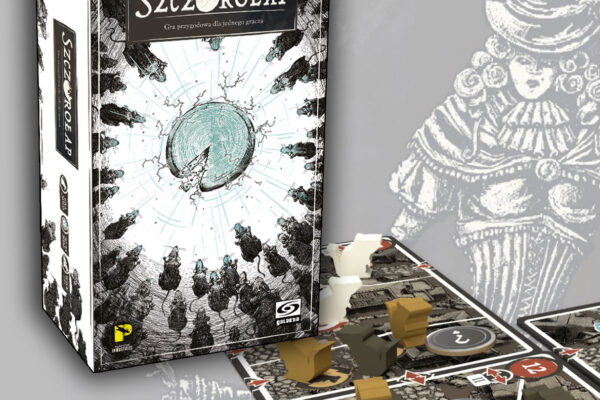 pudełko i kilka komponentów gry Szczurołap wydawnictwa Galakta