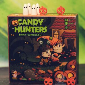 Candy Hunters, pudełko z kilkoma elementami z gry, drewniane znaczniki dyń i drewniane duszki