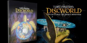 Okładka podręcznika w uniwersum Świat Dysku RPG „Terry Pratchett’s Discworld: Adventures in Ankh-Morpork” z ilustracją Dysku niesionego przez gigantycznego żółwia A’Tuin oraz cztery słonie, które podtrzymują świat Dysku, na tle kosmicznej przestrzeni.